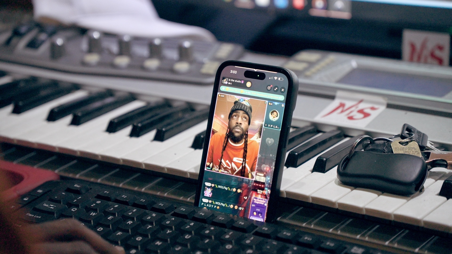 Phone and keyboard detail in the studio