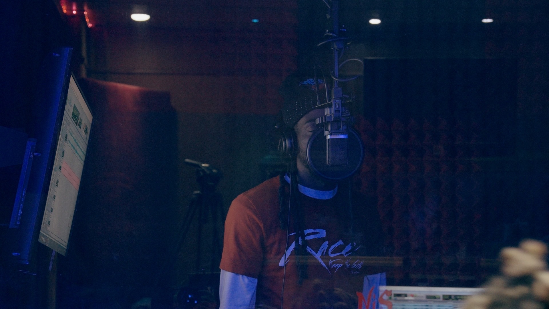 Bizz Da Collector recording in the booth